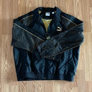 Puma black and gold jacket size L